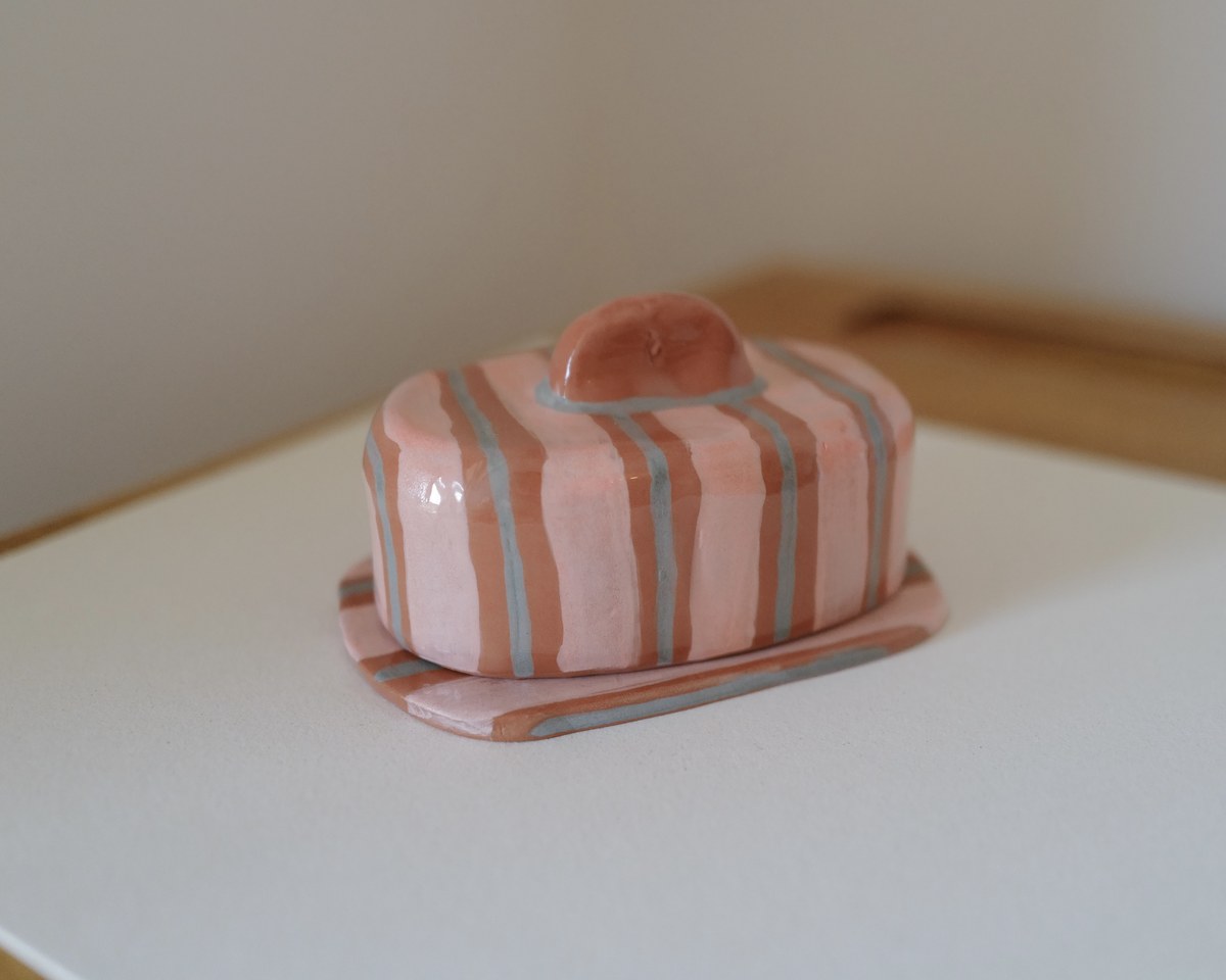 Hand-painted striped butter dish, closed view