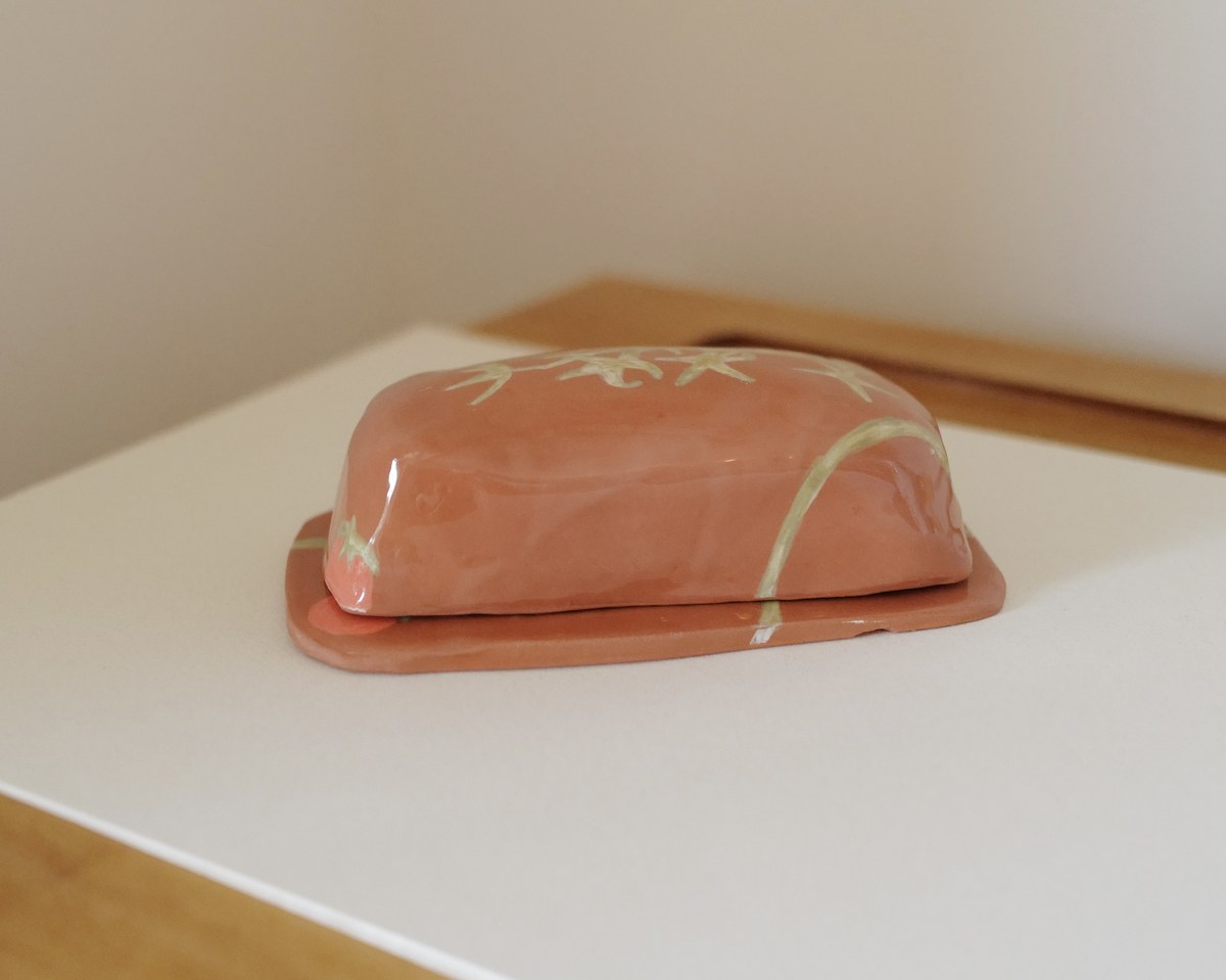 Butter dish with hand-painted tomato vine, lid closed