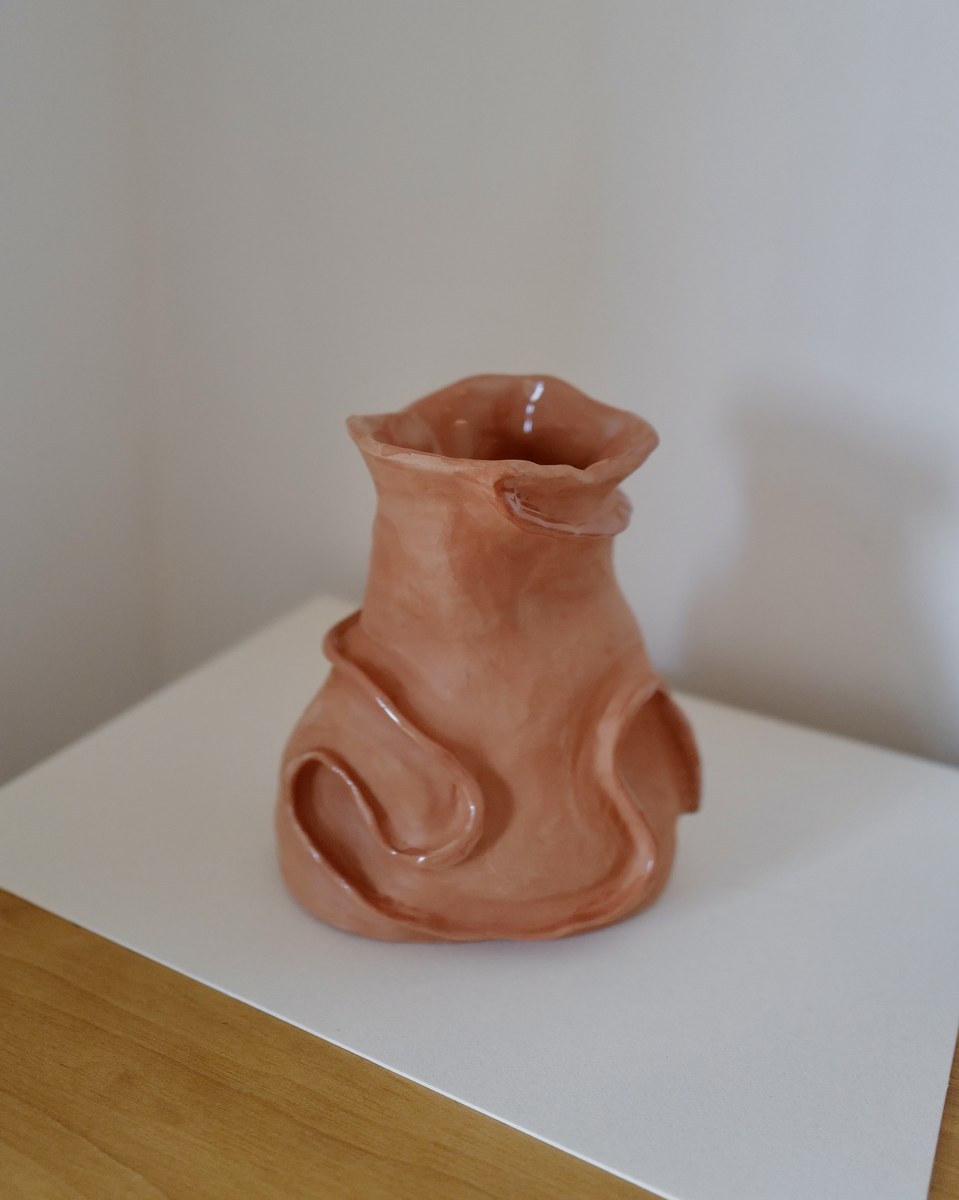 Organic hand-built terracotta vase, front view