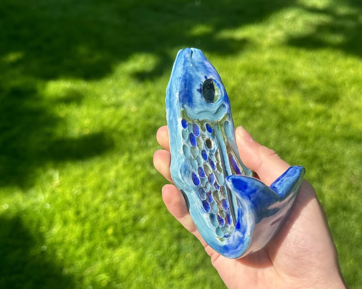 Whimsical blue fish-shaped dish