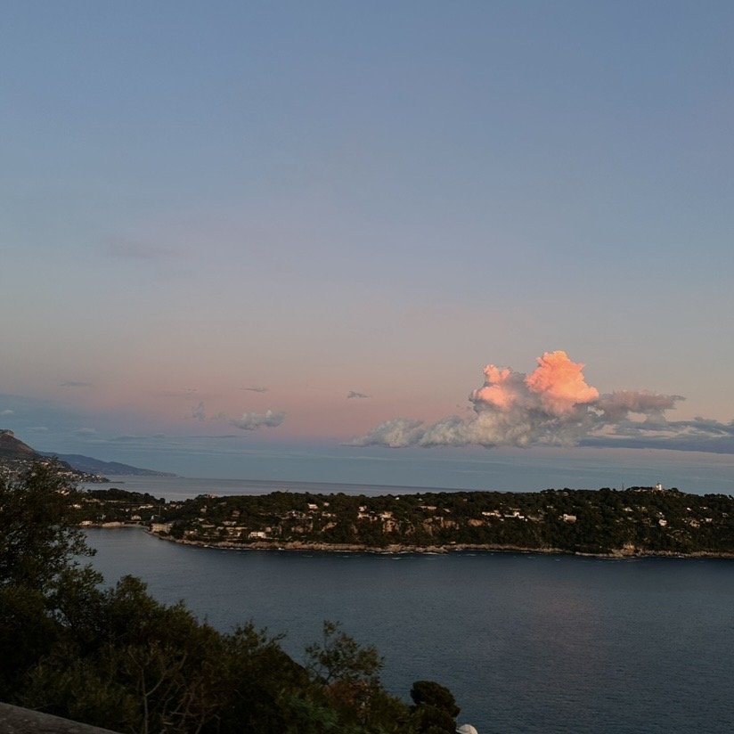 Pink sunset over a coastal headland