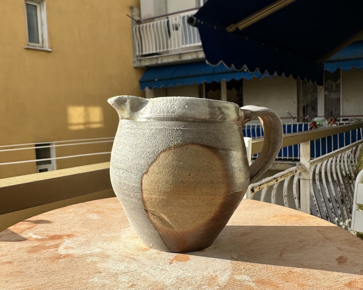 Wood-fired pitcher with handle and spout